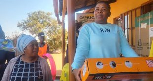 Executive Mayor handing over presents